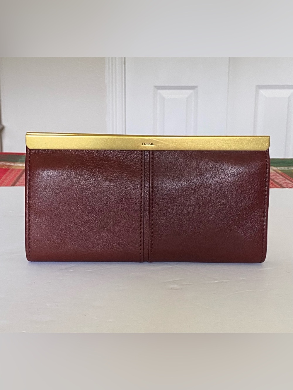 Fossil Burgundy Red Brown Sleek Leather Clutch Wallet with Gold Accent NEW